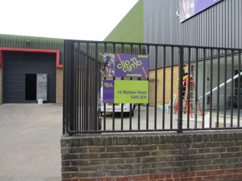Clip N Climb fence sign